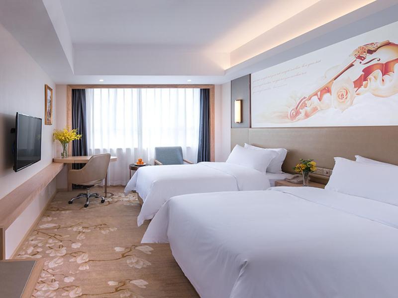 Vienna Hotel Shenzhen Pingji Ave Eksteriør bilde